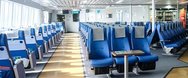 Economy class seats inside the Balearia Caribbean Jaume II fast ferry from Fort Lauderdale to Bimini